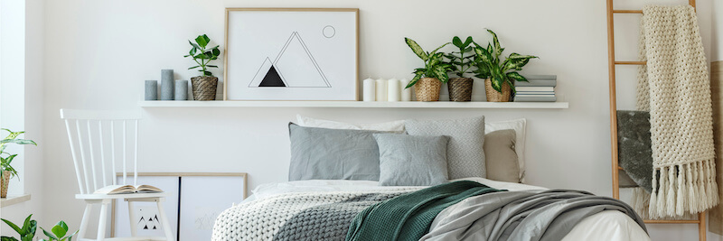 Leaning Artwork Above Bed